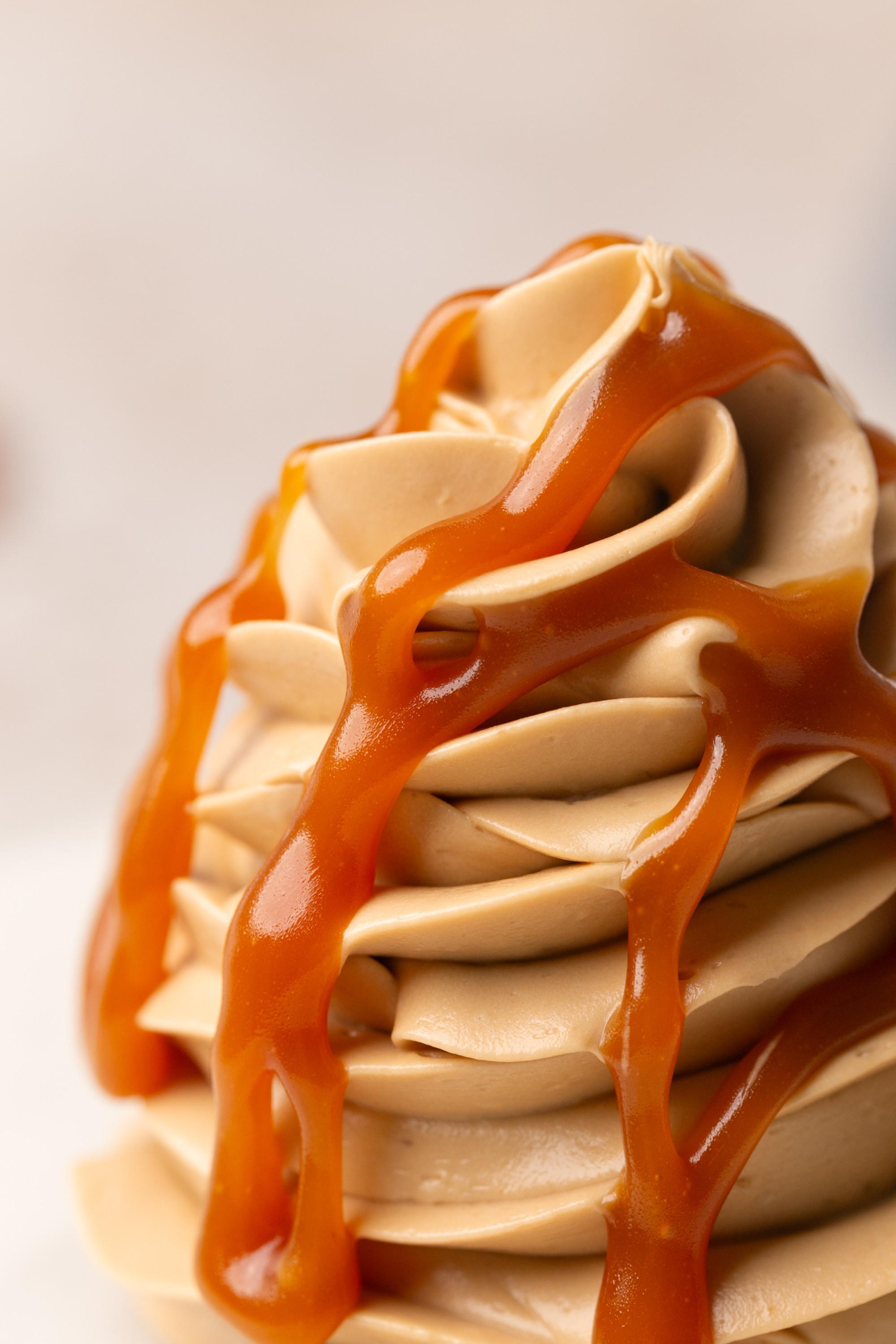 Caramel drizzle over a dollop of Salted Caramel Swiss Meringue Buttercream